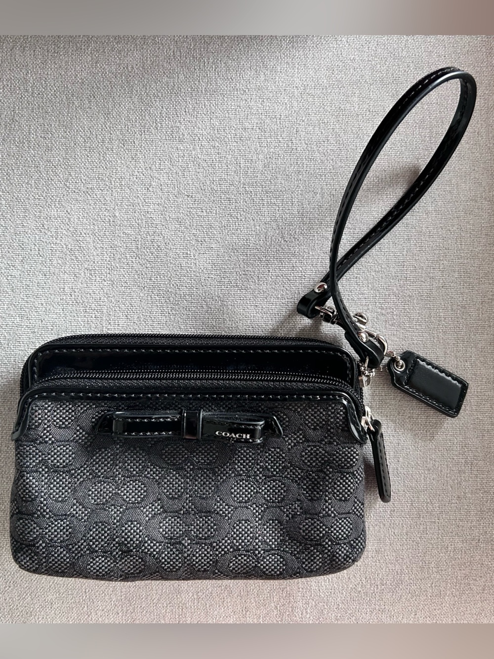 Coach Black Double Zip Wristlet Wallet in Signature Canvas with bow accent